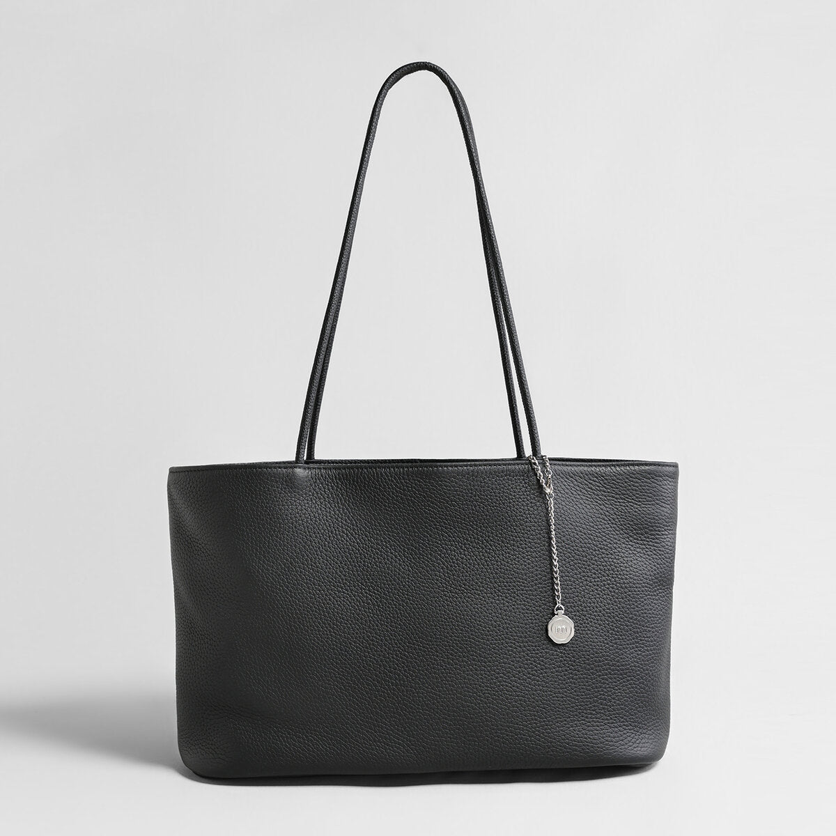 Pebbled Leather Medallion Tote