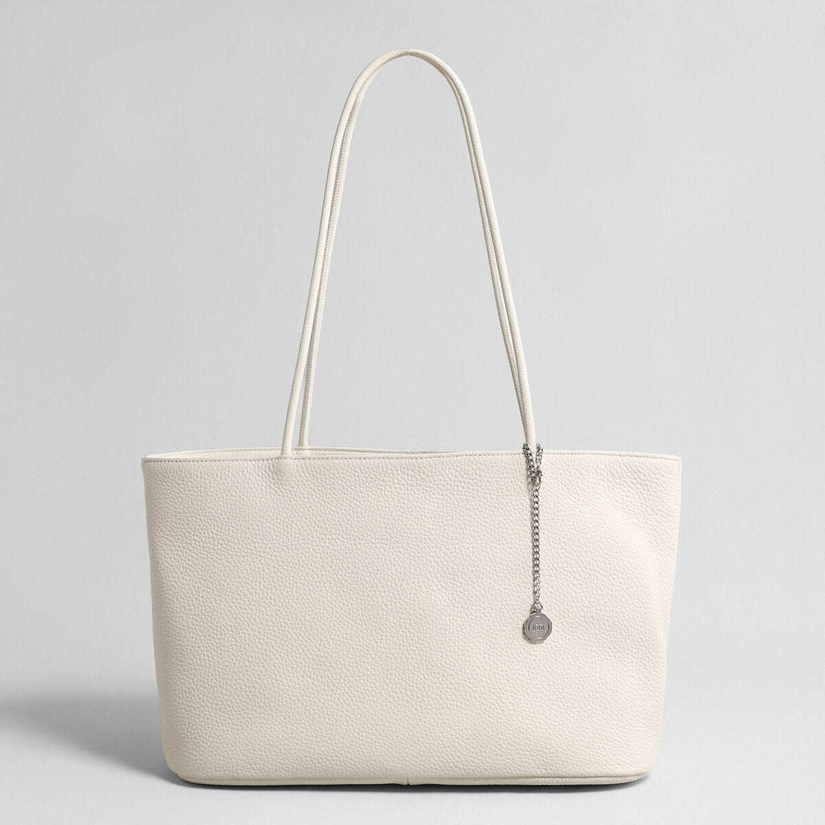 Pebbled Leather Medallion Tote
